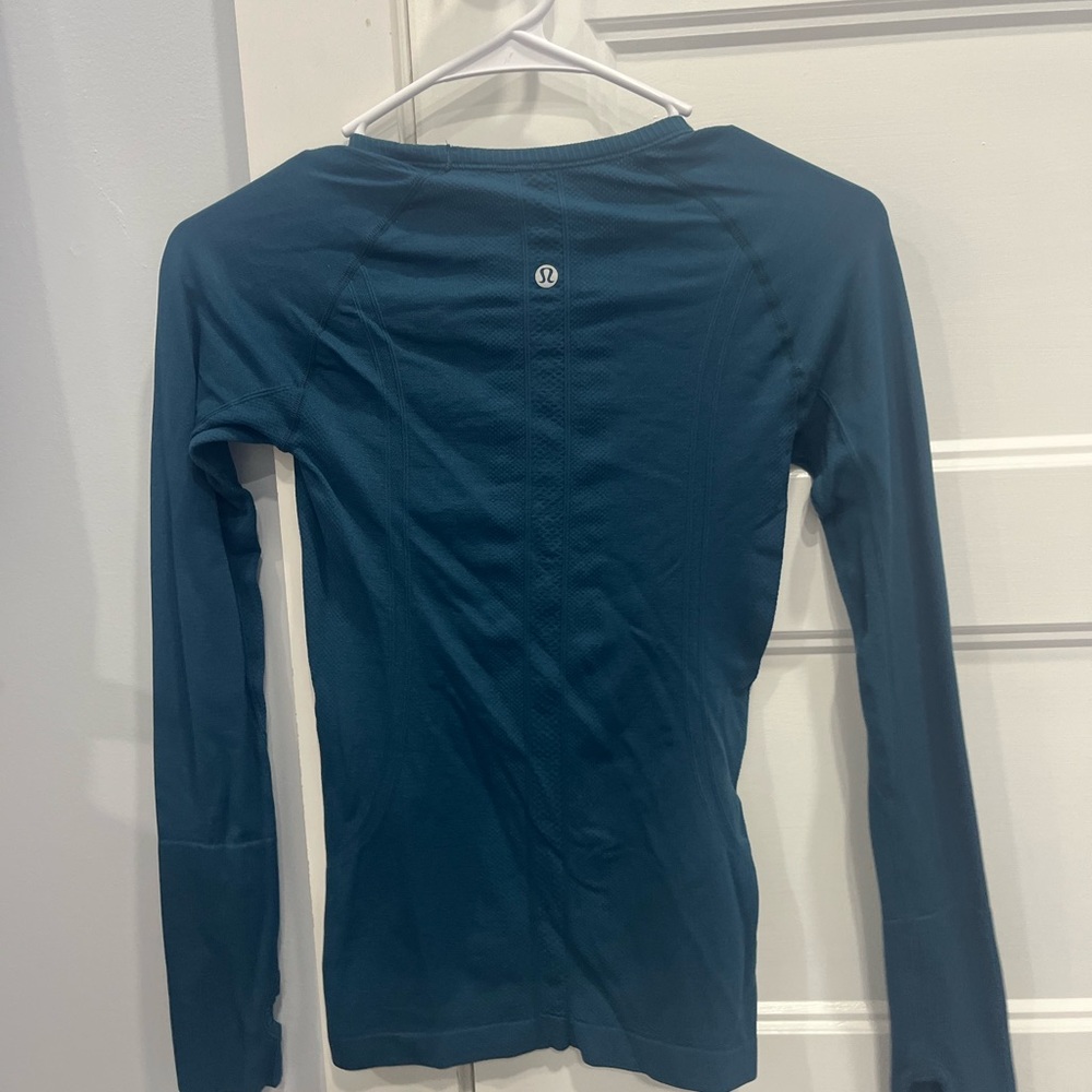 Turquoise Lululemon swiftly tech long sleeve size 4